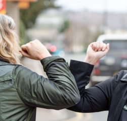 Elbow bump. Novel greeting to avoid spread of coronavirus